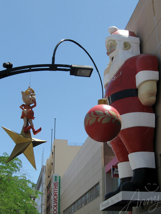 Rundle Mall Christmas decorations: a bloated elf doesn't like the smell of Santa.